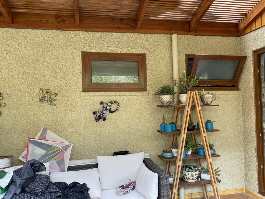 Ventana termopanel PVC folio madera con vidrio satén Baño