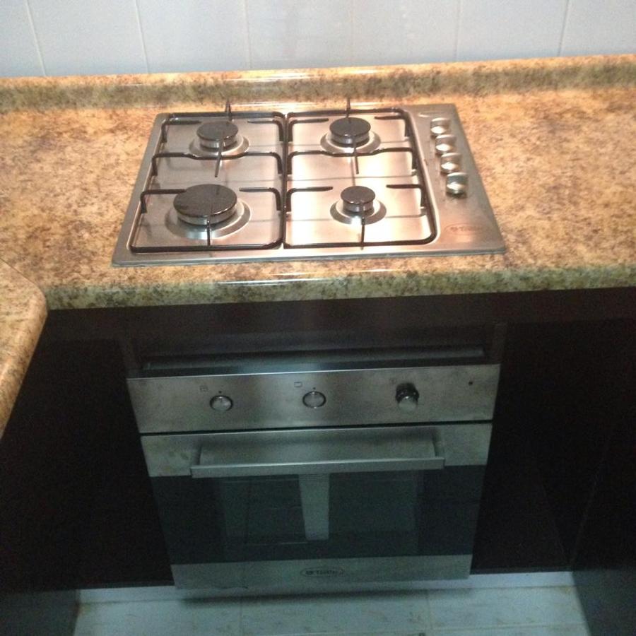 Foto: Encimera y Horno Empotrado en Cubierta de Muebles Aramue Talca