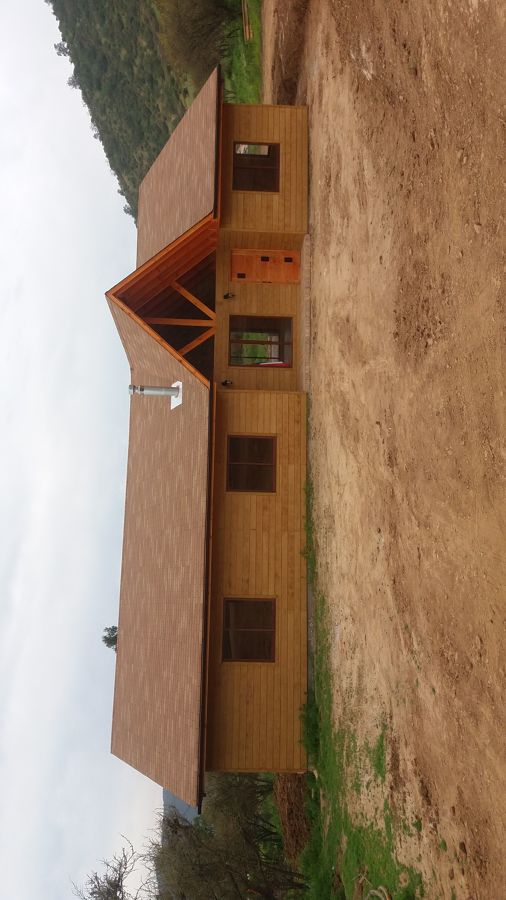 Casa cubierta con siding canadiense