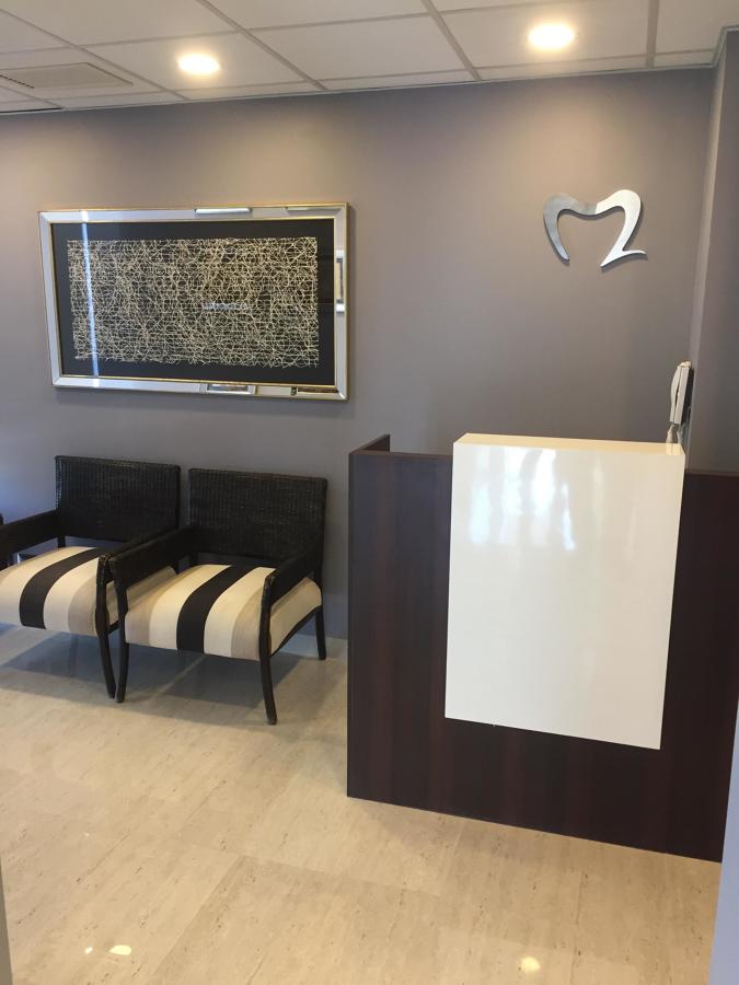 SALA DE ESPERA Y RECEPCION CLINICA DENTAL M2