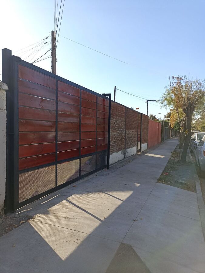 porton con cerca ladrillo