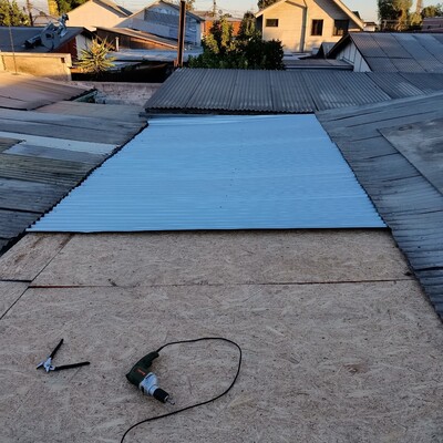Intalación de planchas y de zinc