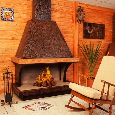 chimenea cobre martillado con pino oregon
