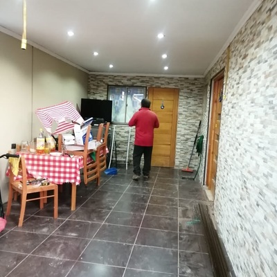 Instalacion cerámica fachada y remodelación puerta