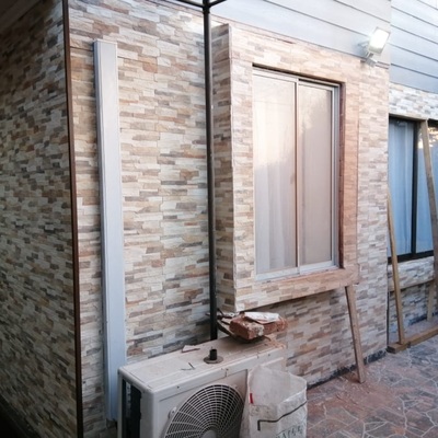 Instalacion cerámica fachada y remodelación puerta
