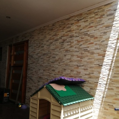 Instalacion cerámica fachada y remodelación puerta