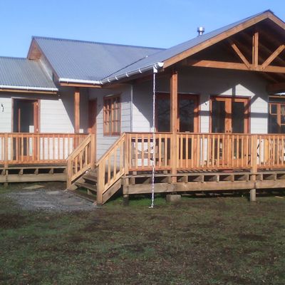 casa tipo cabaña con terraza
