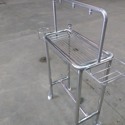 mesa de zanitisado. con accionado de mano, acero inox.