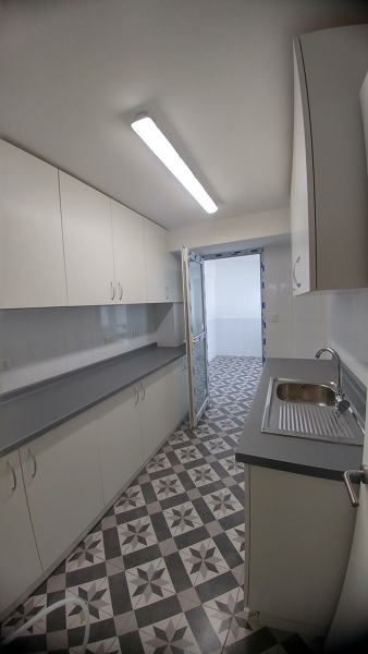 Cocina y Loggia, remodelacion casa las Condes