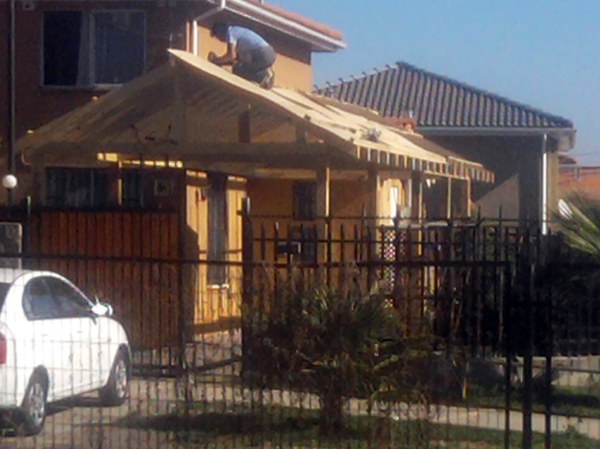 Foto: Cobertizo con Vigas a la Vista de Remodelaciones Y Construccion