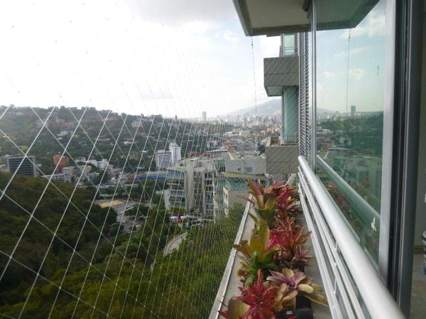 Mallas de protección anticaidas balcón ventanas