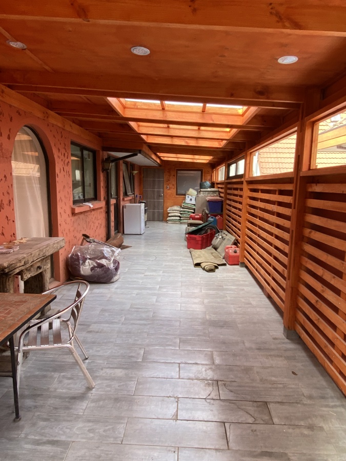 Cobertizo y conexión a bodega