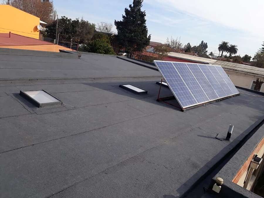 Tragaluces y panel solar