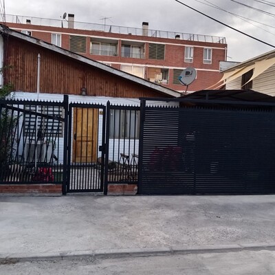 Modificación de portón y estacionamiento