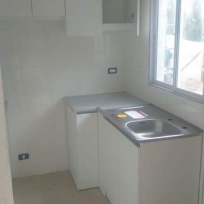 Level ltda. santiago Como diseñar cocina laundry