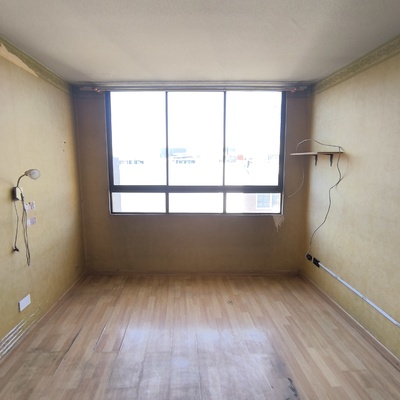 Remodelación de departamento, restauración de muros y cambio de piso flotante