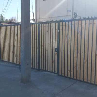 Mantención e instalación de Madera en cerco de Protección