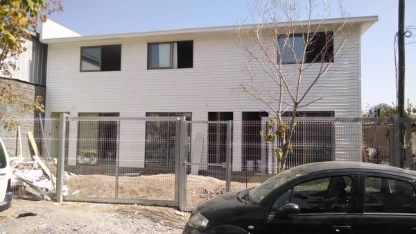 Fachada casa 224 m2 en construcción.