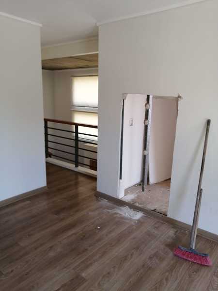 Reparación apertura vano de puerta para conexión a casa existente