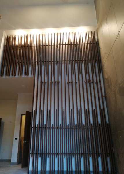Revestimiento hall acceso edificio