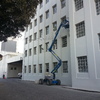 Esmale al agua en fachada edificio produccion