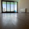 Instalación de Piso Flotante (retiro de cerámica, nivelación de piso)