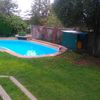 Jardin con piscina