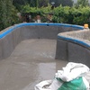 piscina reparada y pulida lista para aplicación de pintura