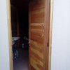 puerta de madera lenga en entrada principal a logia
