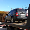 subiendo vehiculo a camion 