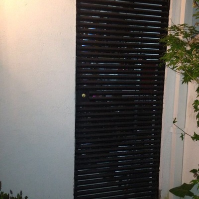 Puerta metálica tipo celosia de 0 70 x 2 00 - Las Condes (Región